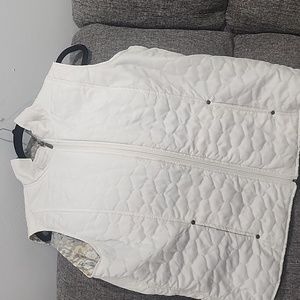 Reversible quilted cream / blue grey  animal print vest. Pockets on both sides